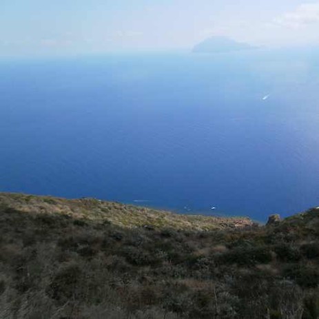 The blue of the water and the gorgeous view of Filicudi from the top of the volcano in Alicudi